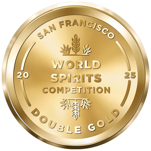 Gold medal with San Francisco World Spirits Competition Double Gold text, wheat stalks, grape vine embossed.